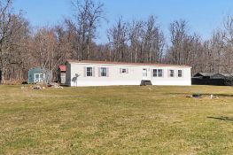 2 BEDROOM, 2 BATH MOBILE HOME & SHEDS ON .75 ACRE LOT