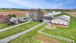 10.27 ACRE TURKEY FARM W/ HOUSE-SHOP-HOOP BARN-FEED MILL