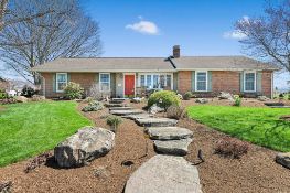 4 BEDROOM, 2.5 BATH BRICK RANCHER ON 0.30 ACRE LOT