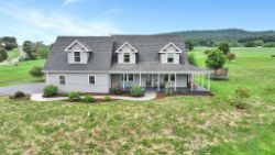 4 BEDROOM, 3 BATH HOME W/ ATTACHED 2 CAR GARAGE & SHED ON 1.98 ACRES
