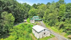 2 BED 1 BATH HOME W/ DETACHED GARAGE ON 3.6 ACRES