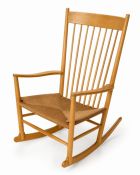 A Danish J16 Rocking Chair. Designed by Hans Wegner for FDB Møbler. Stamp date 1966.