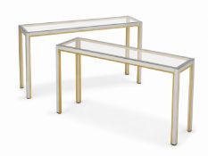 A Pair of Italian Chrome and Gilt Metal Console Tables with Glass Tops. Designed by Renato Zevi