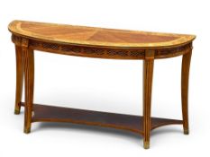 A Cherrywood Console Table with Elm and Burr Elm Crossbanding. Bow front over a closed fret frieze