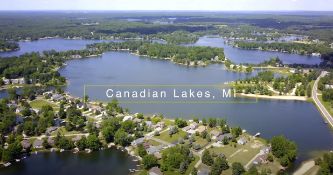 Surrounded by a Golf Course, Lakes, and Scenic Beauty in Mecosta County, Michigan!