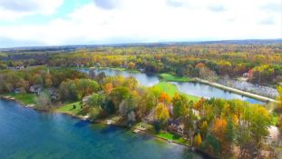 Prime Lot Nestled between Golf Course & Lakes in Michigan!