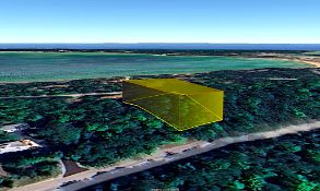 Wooded and Buildable Michigan Lot Near Presque Isle Harbor!