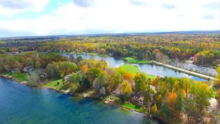 One-Acre Michigan Lot Behind the Golf Course in Canadian Lakes!