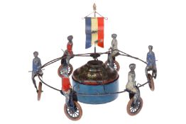 Fahrradkarussell, Frankreich um 1900, mit 6 Einradfahrern, CL, gummibereift, Uhrwerk intakt, leichte