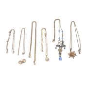 A group of silver and white metal jewellery including two silver chains, a silver gilt chain with