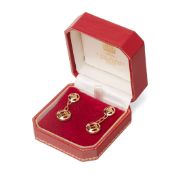 A pair of 18ct gold Cartier drop earrings, marked Cartier 750, DY6065 to the edge of each drop,