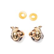 A pair of tri-colour 18ct gold knot earrings, of triple loop form, with clip on fastenings, total