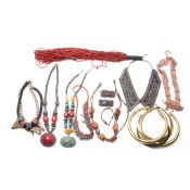 A group of vintage jewellery and costume jewellery of Egyptian, Navajo, and African styles,