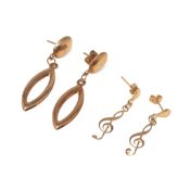 A pair of 9ct gold earrings formed as treble clefs, and another pair of 9ct gold drop earrings,