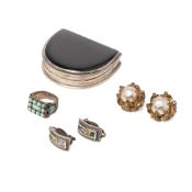 A group of silver and costume jewellery including a pair of clip on earrings, each set with