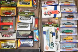 A collection of boxed contemporary die cast model vehicles to include, Corgi Dinky and other similar