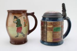 Royal Doulton Kingsware golfing tankard with a Mettlach tankard, modelled as library books (2),