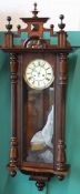 A 19th century Vienna wall clock, by Gustav Becker, walnut case with turned decorative finals, the