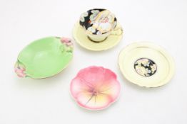 A Paragon 'Double Hibiscus' pattern cup and saucer together with an addition saucer, together with
