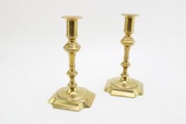 A pair of Queen Anne style brass candlesticks, 18cm tall (2).