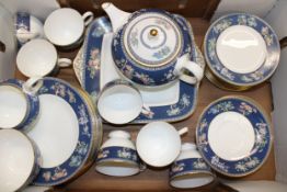 A Wedgwood tea service in the Blue Siam pattern to include a large square sandwich plate, a