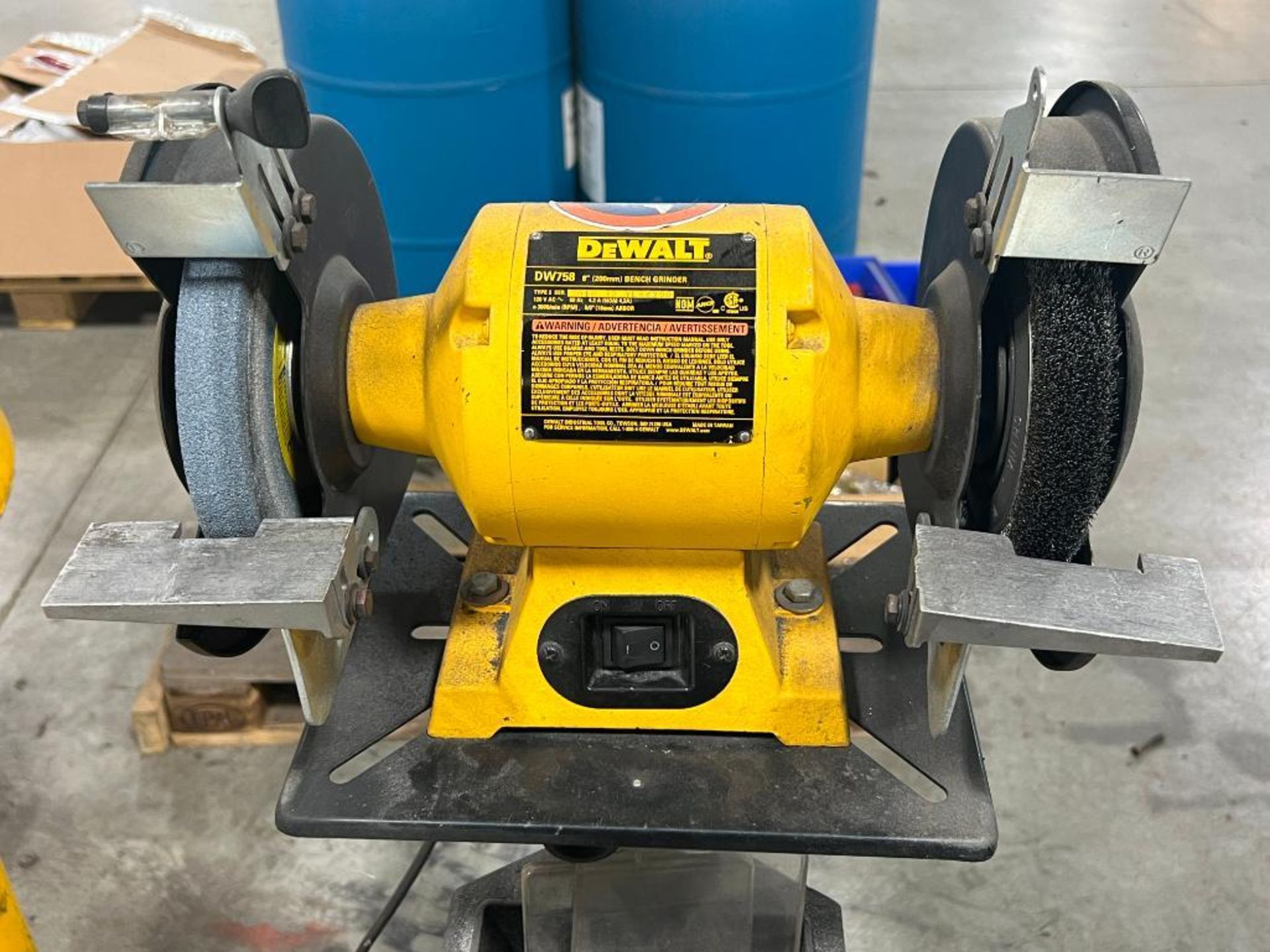 DeWalt model DW758 8 inch bench grinder on pedistal. 120V, 3600/min RPM.