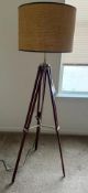 Euro Design Surveyor tripod floor lamp with a cherry wood finish and linen drum shade