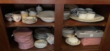 Contents of China Cabinet Lower Shelves with 7 Fiesta Plates