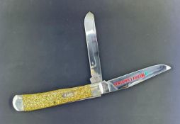Case XX Trapper Knife from the Limited Edition Christmas Series Model 10254 with Gold Stardust Kirin