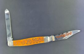 Case XX Moose Pocket Knife Featuring a Halloween Themed Persimmon Orange Bone Scrimshaw Handle