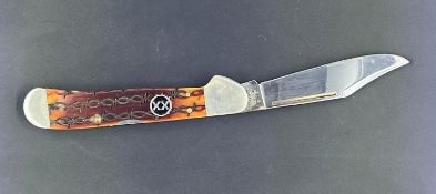 Case XX Barbed Wire Large Copperlock with Amber Bone Handle and Nickel Silver Bolsters