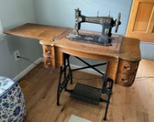 White USA Treddle Sewing Machine in original oak stand