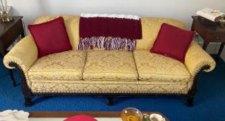 Antique Chippendale Style Sofa Featuring Ornate Dark Wood Carvings