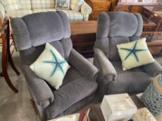 Pair of Plush Recliners with Throw Pillows