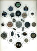 A CARD OF DIVISION ONE ASSORTED BLACK GLASS BUTTONS