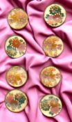 A SMALL CARD OF DIVISION THREE JAPANESE BUTTONS