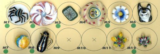 A PARTIAL CARD OF DIVISION THREE GLASS BUTTONS