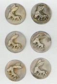 A SMALL CARD OF MATCHING METAL ANIMAL BUTTONS