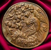 A DIVISION ONE REPOUSSE COPPER BUTTON