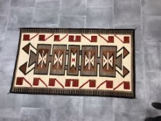 Navaho Style Storm Pattern Rug with Red, White, Brown, and Black Accents