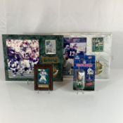 Collection of Four Dan Marino Miami Dolphins Sports Memorabilia Including Plaques and Figurine