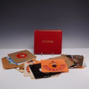 Set of 30 1960s-1970s 45 RPM Vinyl Records and Storage Album