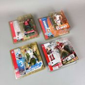 4pc NFL McFarlane Toys Sportspicks Action Figures featuring Michael Vick, John Elway, Joey Harringto