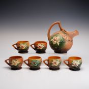 7pc Roseville Pottery Pitcher and Cup Grouping, Magnolia Brown