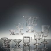 Set of 9 Richards and Hartley Pressed Glass Pitchers and Cups, Cupid and Venus Pattern