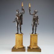 Pair of French Empire Style Patinated Bronze and Ormolu Figures of Apollo and Diana