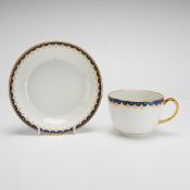 Wedgwood Porcelain Teacup and Saucer with Gilded Cobalt Scalloped Border