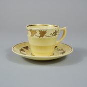 2pc Wedgwood Matt Straw Glazed Cup and Saucer with Gilt Grapevine Pattern