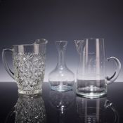 Princess House Glass Including a Nautical Theme Pitcher, a Cut Pattern Pitcher, and a Carafe