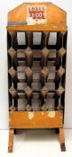 Motoring, Shell X100 Motor Oil bottle wheeled stand (approx. size 31 X 80 X 32 cms). Wooden dividers